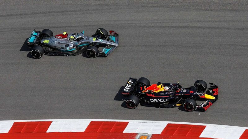 Max Verstappen passes Lewis Hamilton for the lead of the 2022 US GP