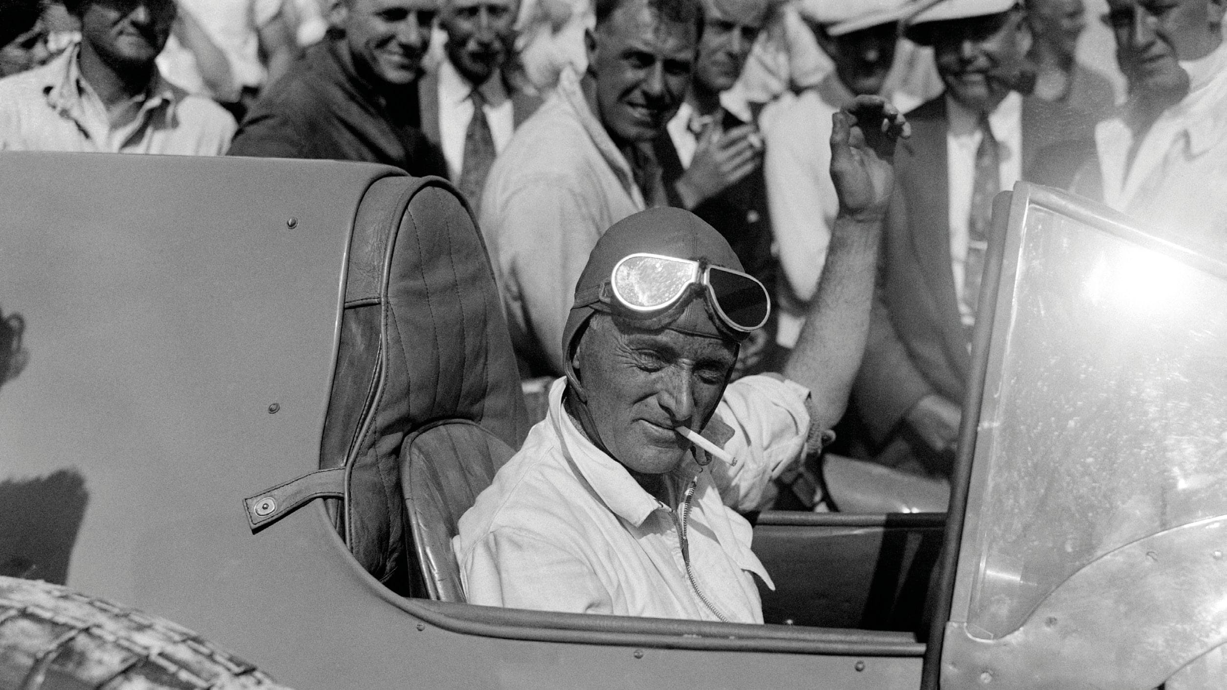 Sir Malcolm Campbell smoking