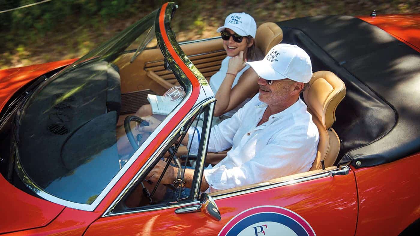 Dads and daughter with Happy Few Racing