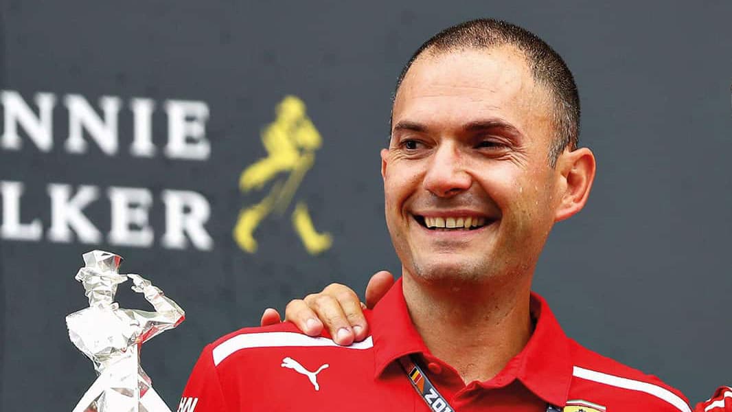 David Sanchez smiles on podium