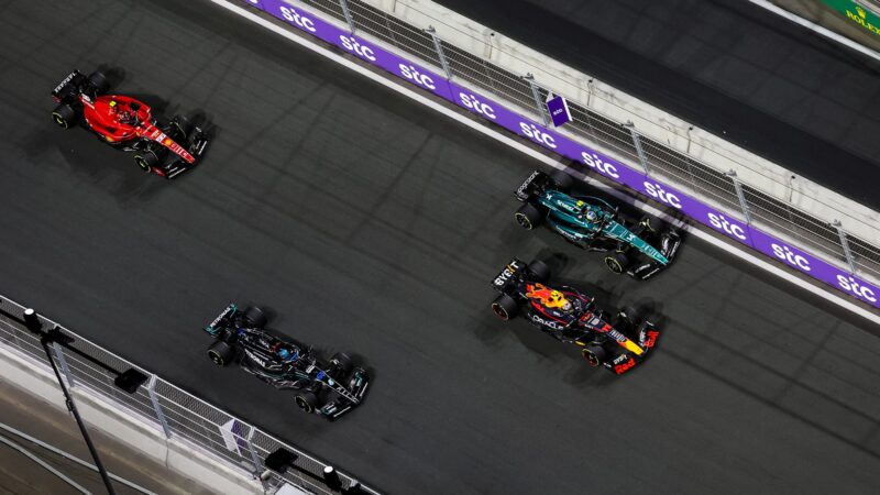 Sergio Perez followed by Fernando Alonso George Russell and Carlos Sainz at the start of 2023 F1 Saudi Arabian GP