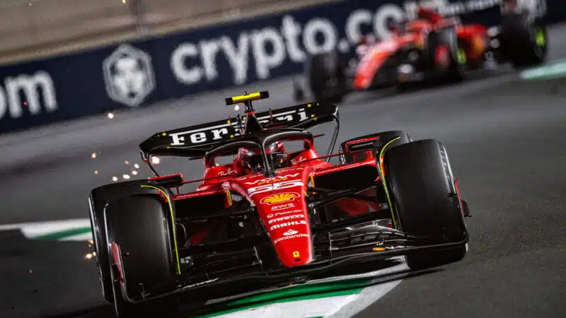 Sparks fly from Ferrari of Carlos Sainz in the 2023 F1 Saudi Arabian Grand Prix