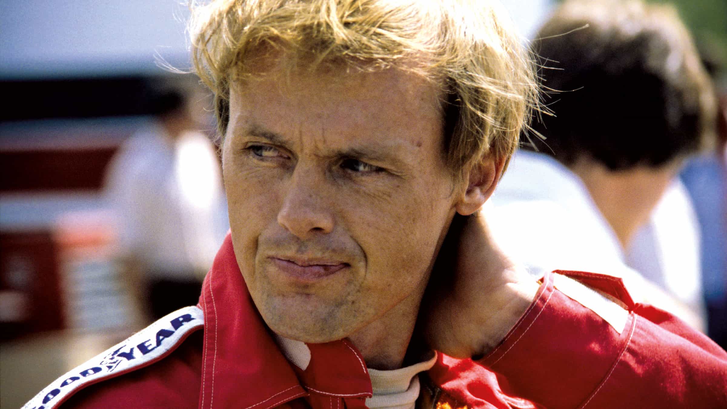 Al Holbert scratches his neck