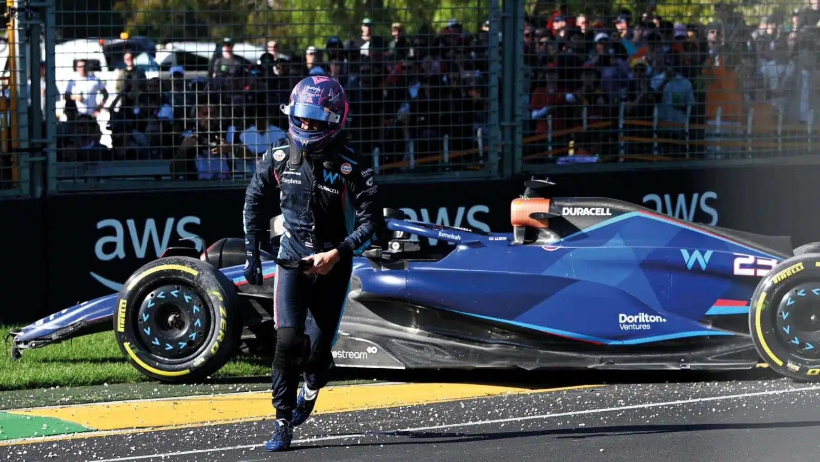 Alex Albon sprints from his stranded