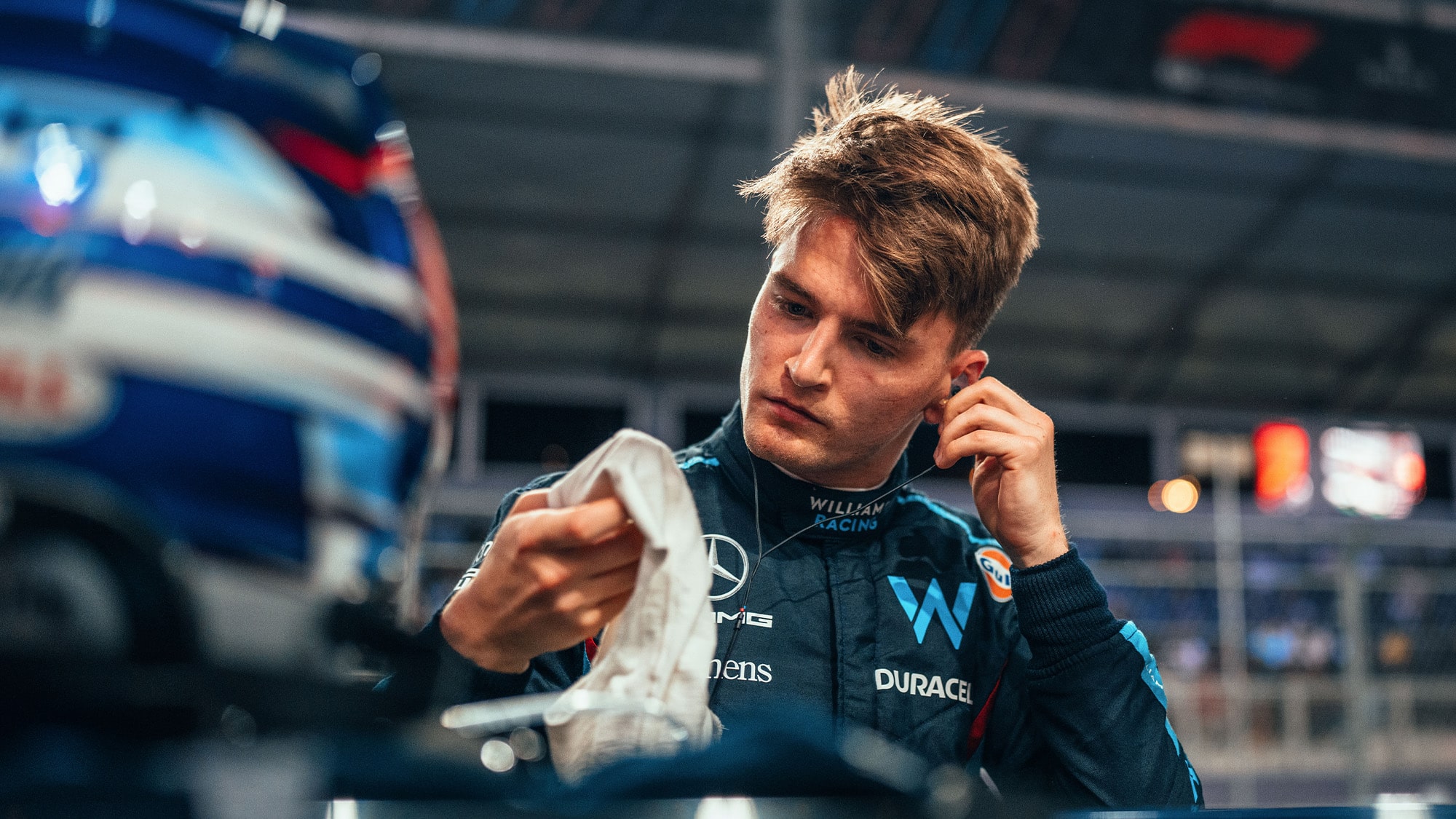 Logan Sargeant pulls out his earplugs after the 2023 Saudi Arabian Grand Prix