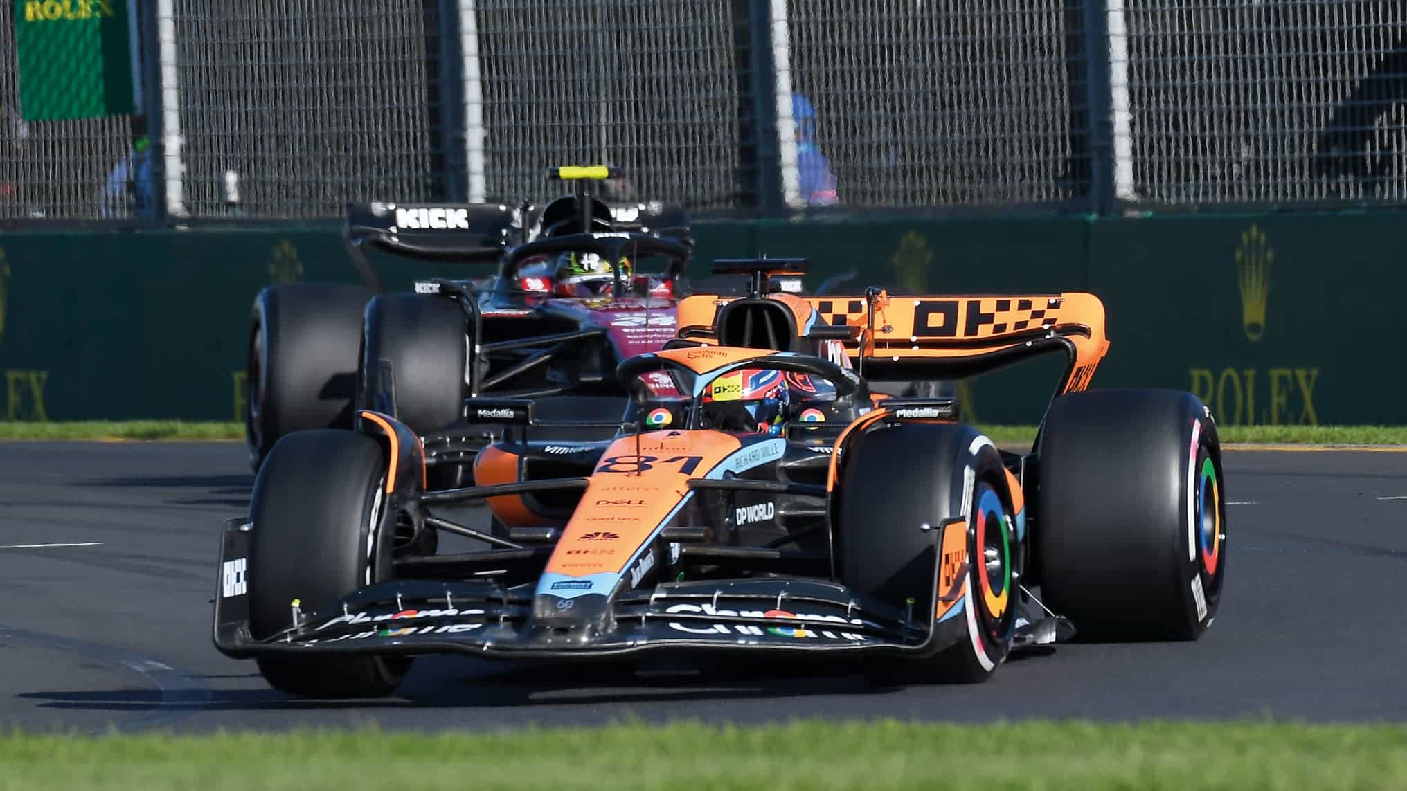 Oscar Piastri leads Zhou Guanyu