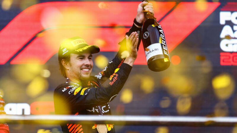 Sergio Perez celebrates Azerbaijan GP victory on the Baku podium