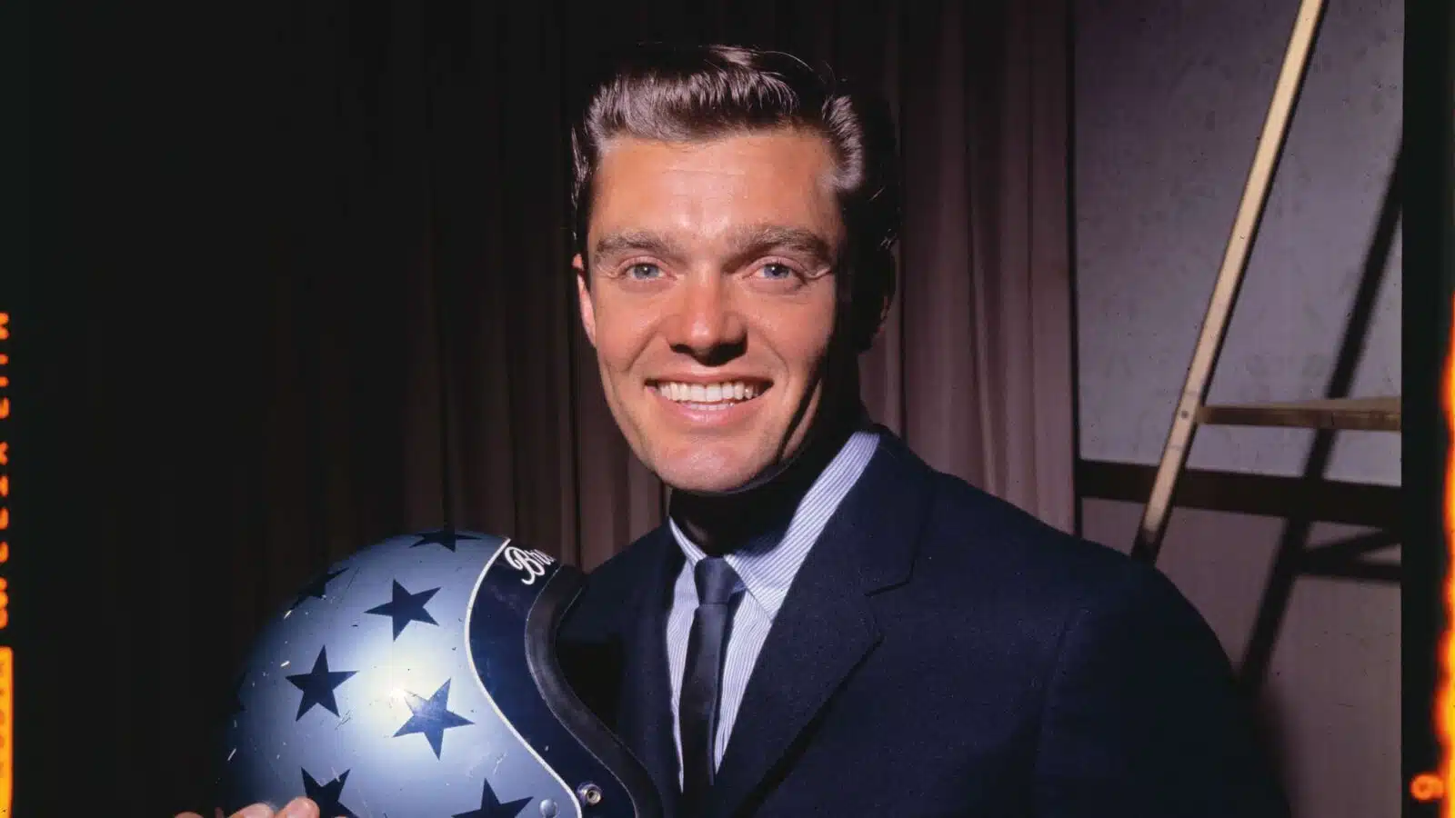 Craig Breedlove holding his helmet