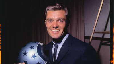 Craig Breedlove holding his helmet