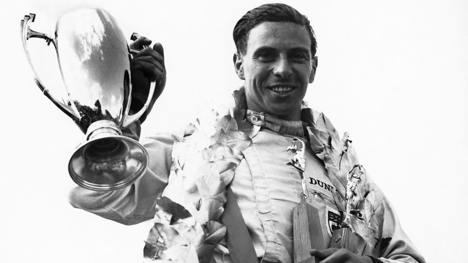 Jim Clark holding a trophy