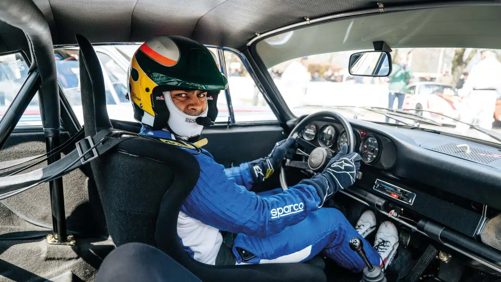 Chandhok behind the wheel of Prosche RSR