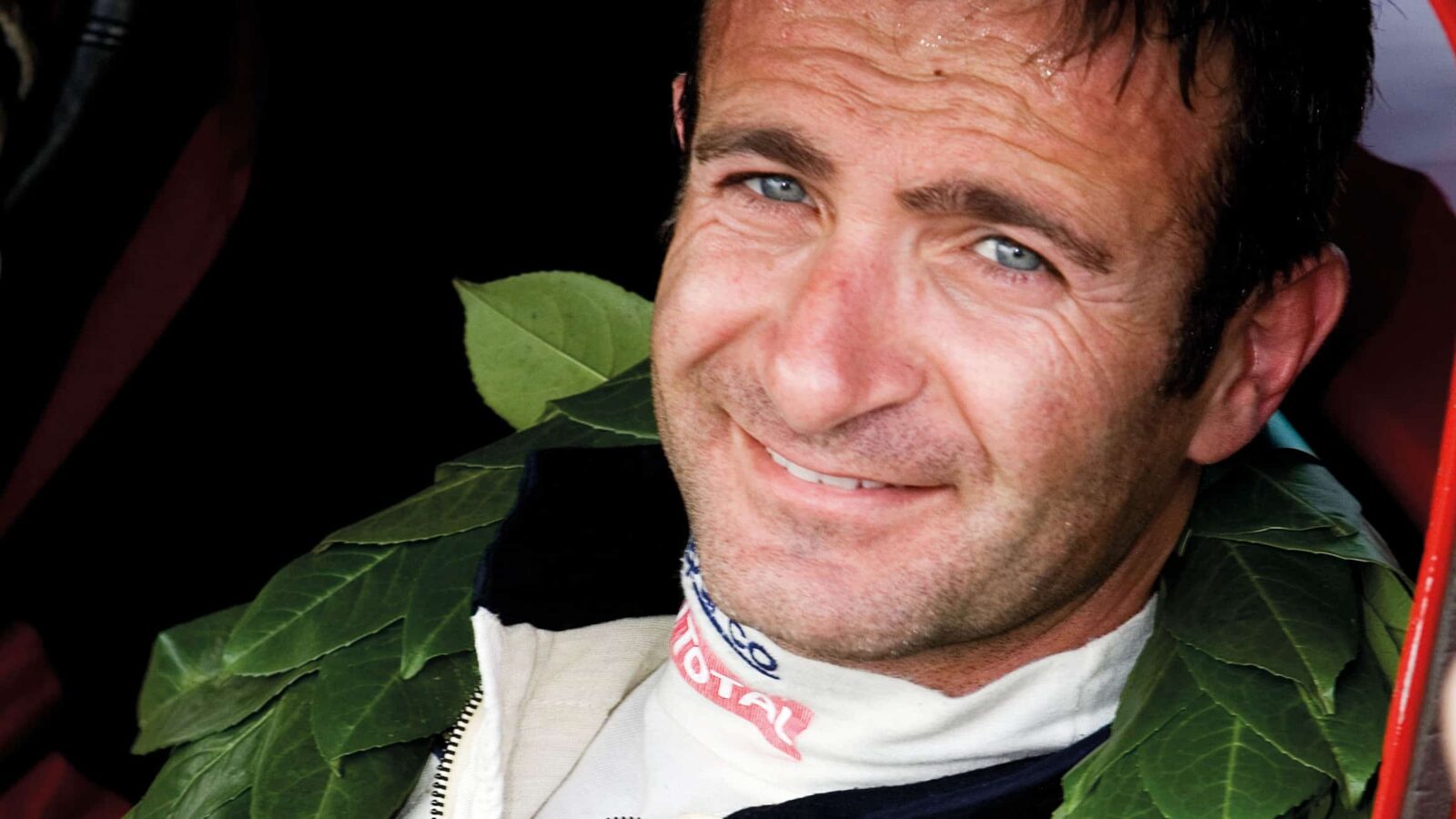 Headshot of Nicolas Minassian behind the wheel