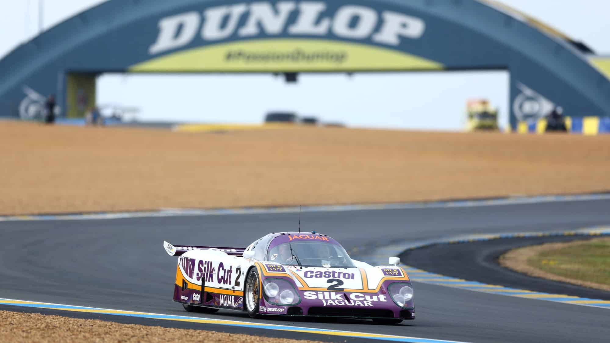 Silk Cut Jaguar at Dunlop Bridge in Le MAns centenary parade