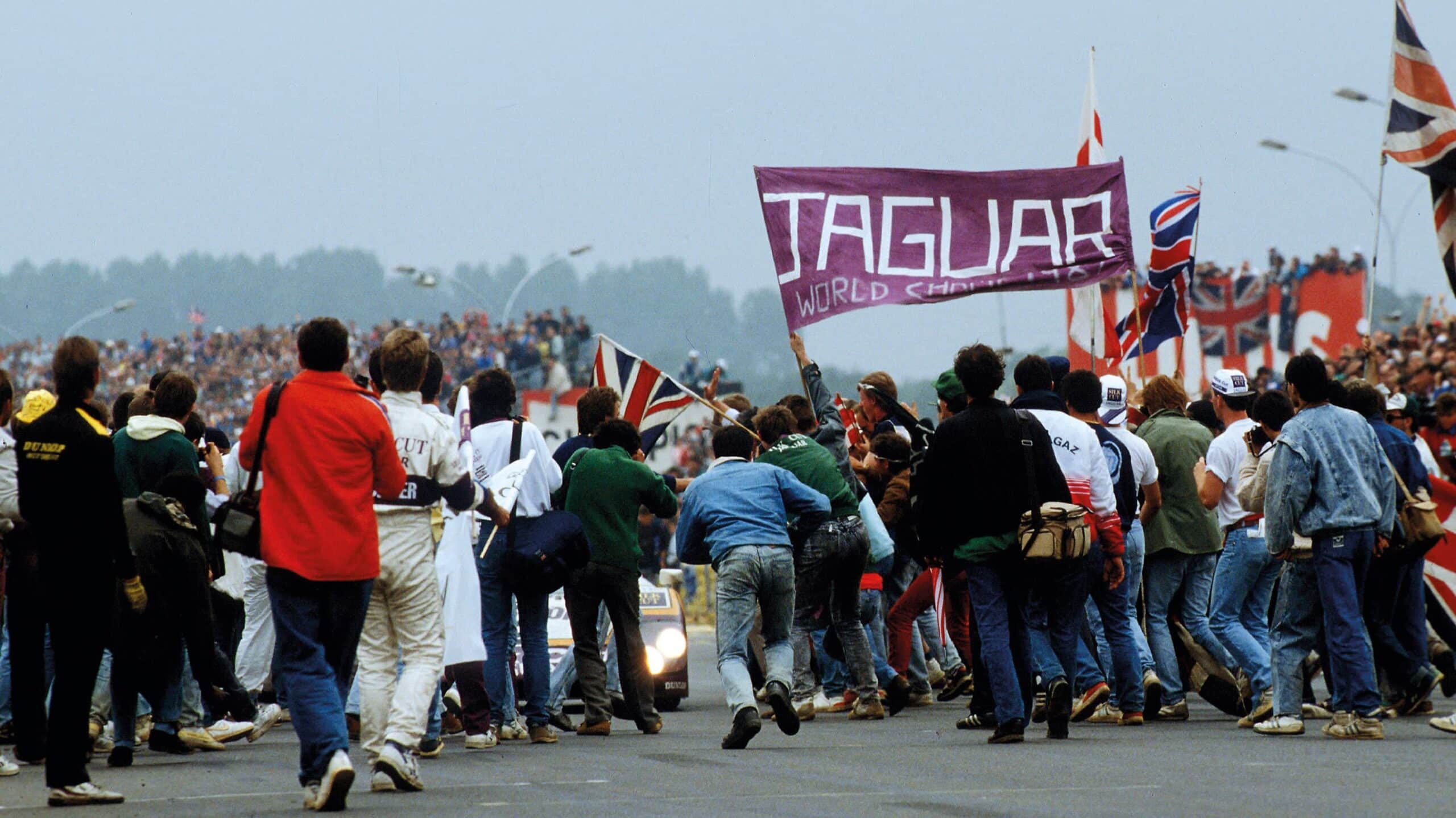 Fans rush to the Jaguar at Le Mans 1988