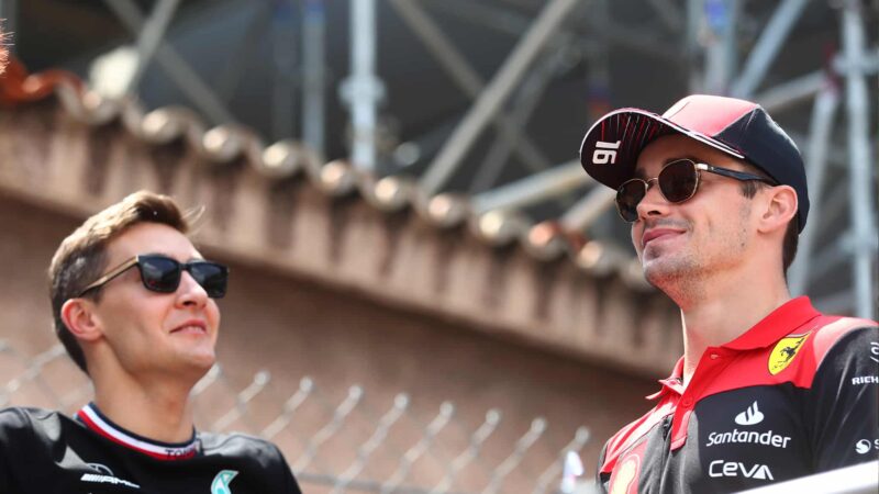 George Russell with Charles Leclerc
