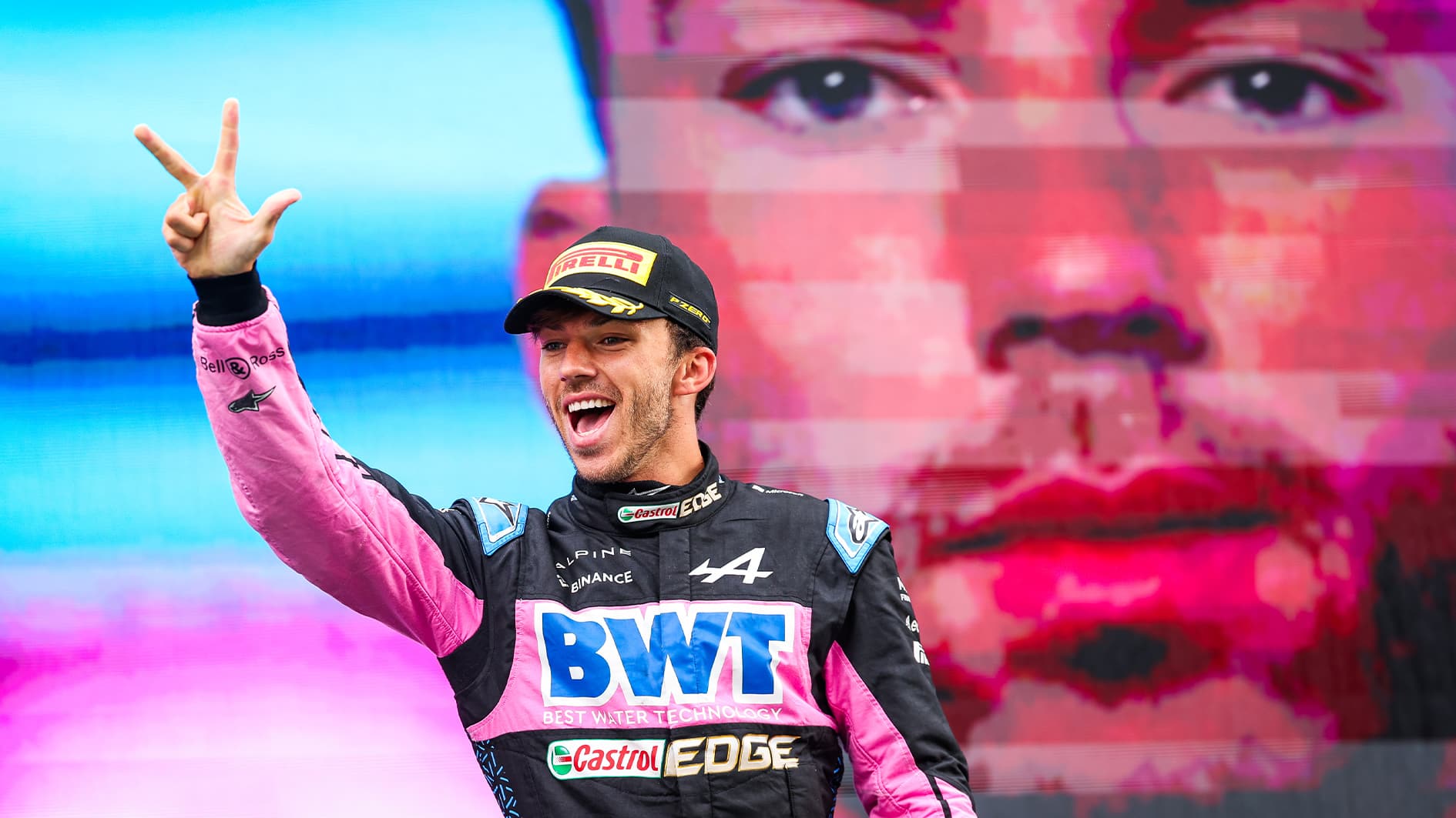 Pierre Gasly holds three fingers up on podium at 2023 Dutch GP