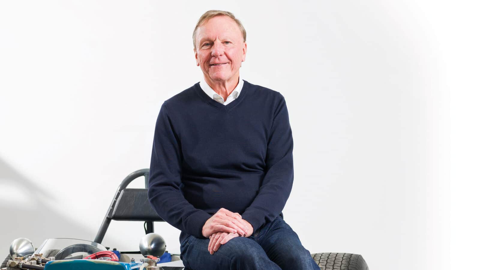 Ray Mallock chilling on car