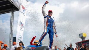 Scott Dixon raises his fist as he celebrates 2023 Saint Louis IndyCar win