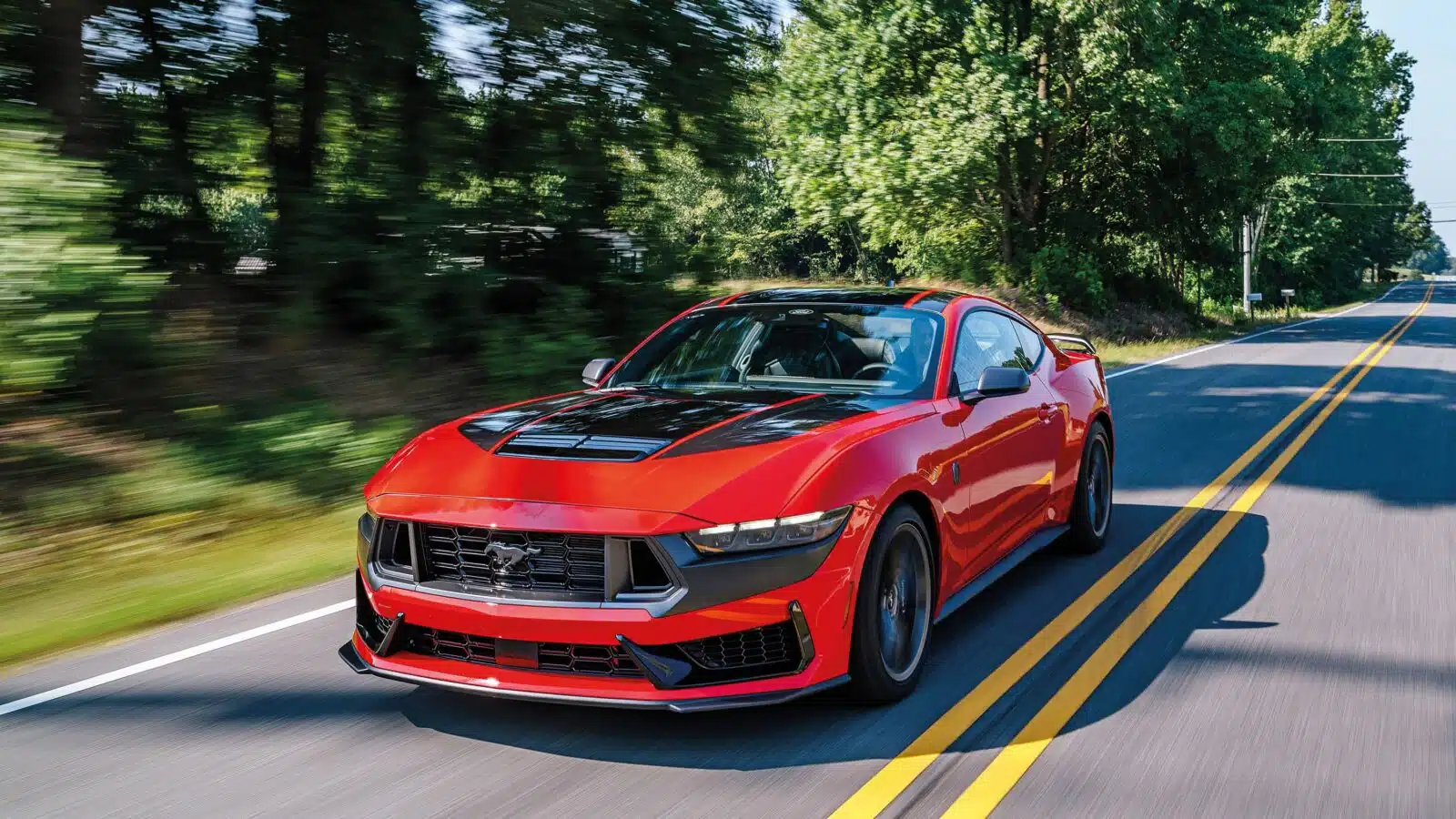 ford mustang dark horse on the road