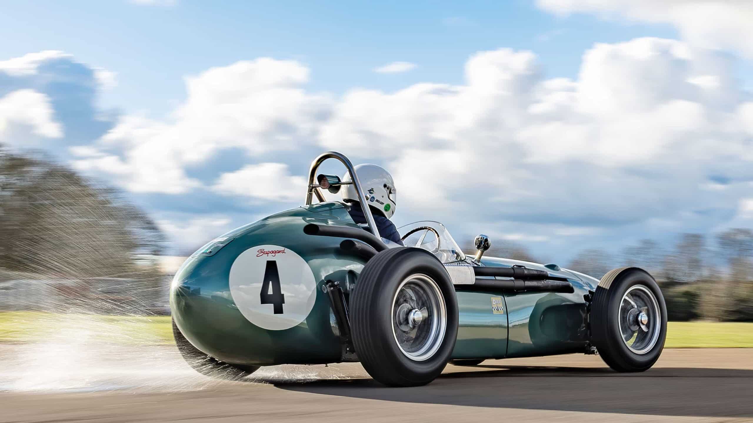 Aston Martin DBR4 kicking up water