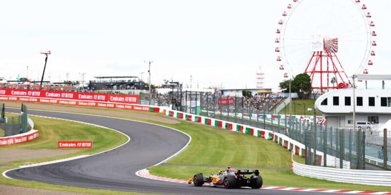 Lando-Norris-heads-into-the-Esses-of-Suzuka