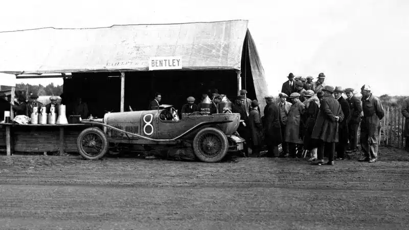 Duff + Clement with their Bentley