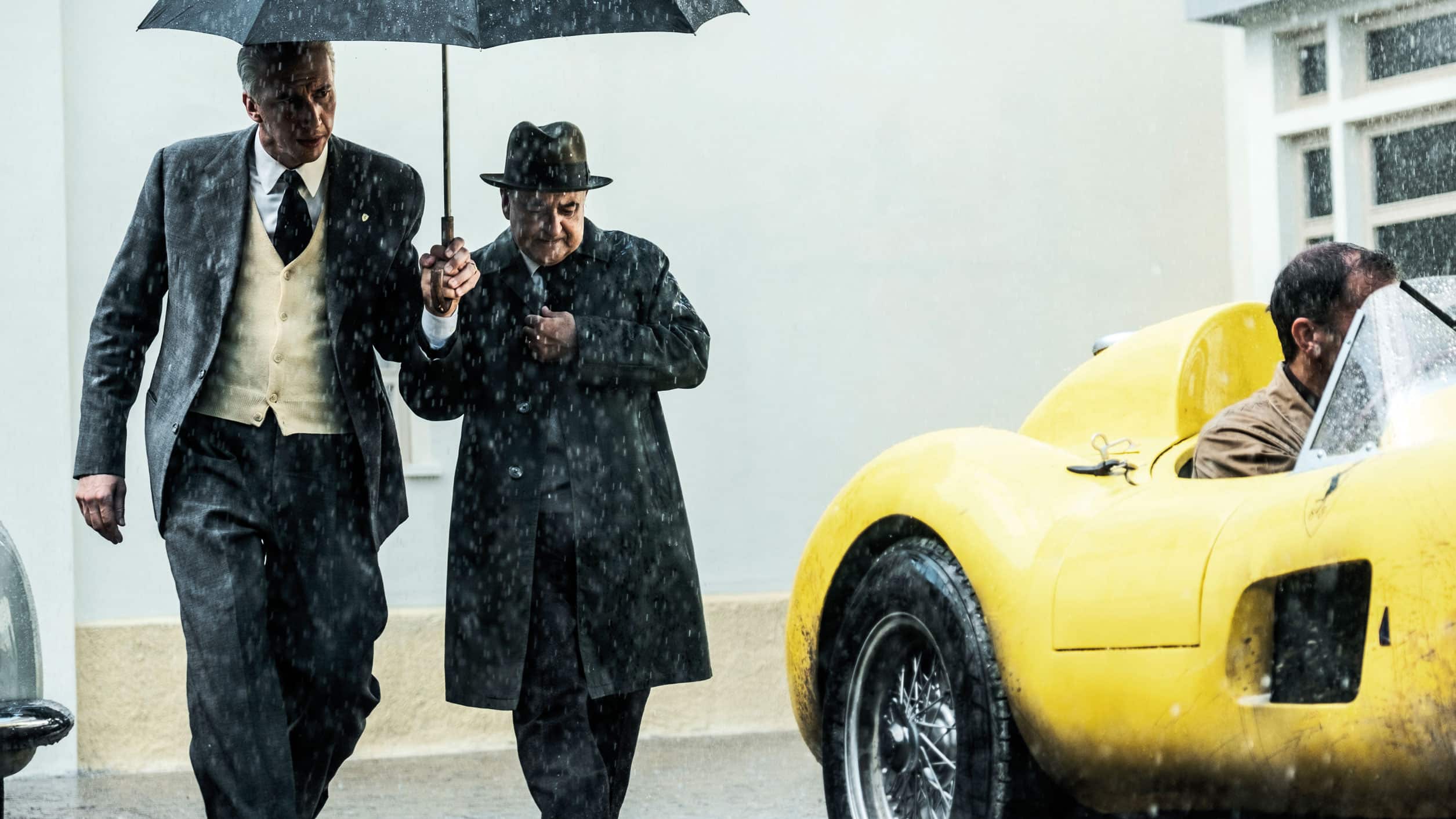 Enzo Ferrari walking in Rain