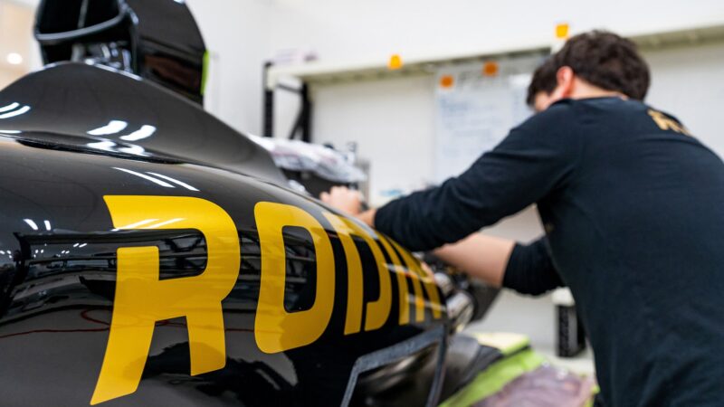 Rodin engineer working on single seater car