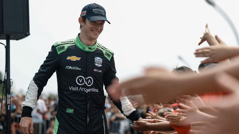 Callum Ilott high-fives IndyCar fans during 2023 season