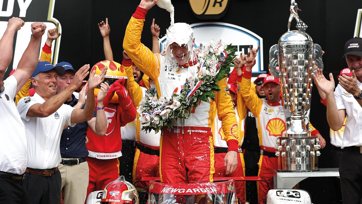 Cream of the crop: Josef Newgarden raises a quart after his 2023 Indy 500 win