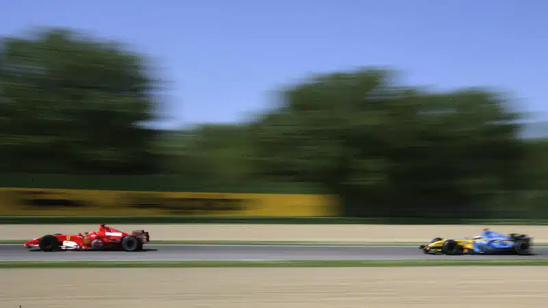 Michael Schumacher leads fernando Alonso in 2006 F1 San Marino Grand Prix