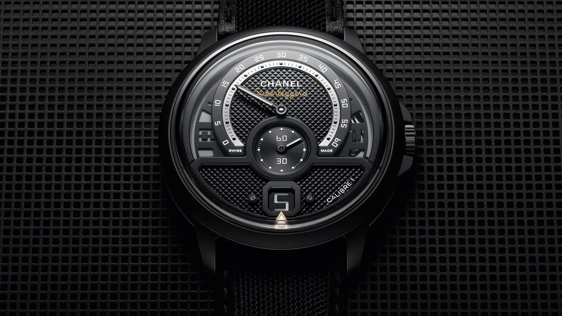 The Monsieur’s black ceramic and stainless steel case encloses a speedometer-derived dial