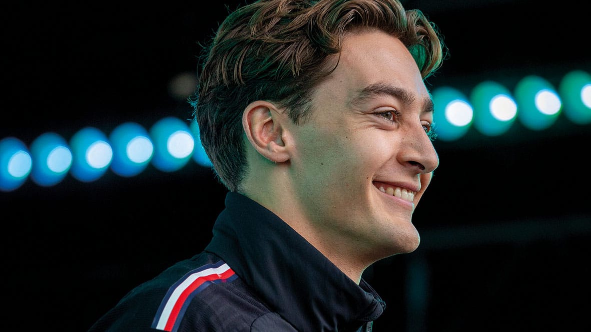 George Russell smiling