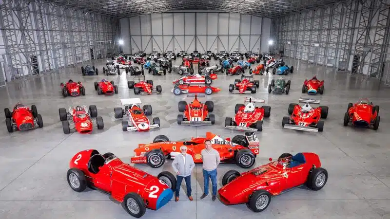 Bernie Ecclestone and Tom Hartley Junior in front of Ecclestone car collection