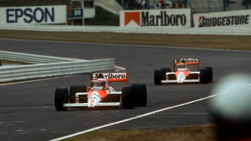 Ayrton Senna and Alain Prost on track
