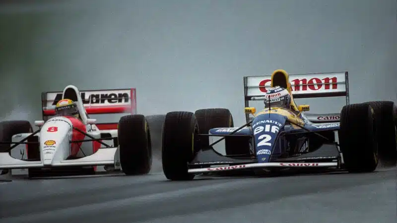 Ayrton Senna and Damon Hill battle on track