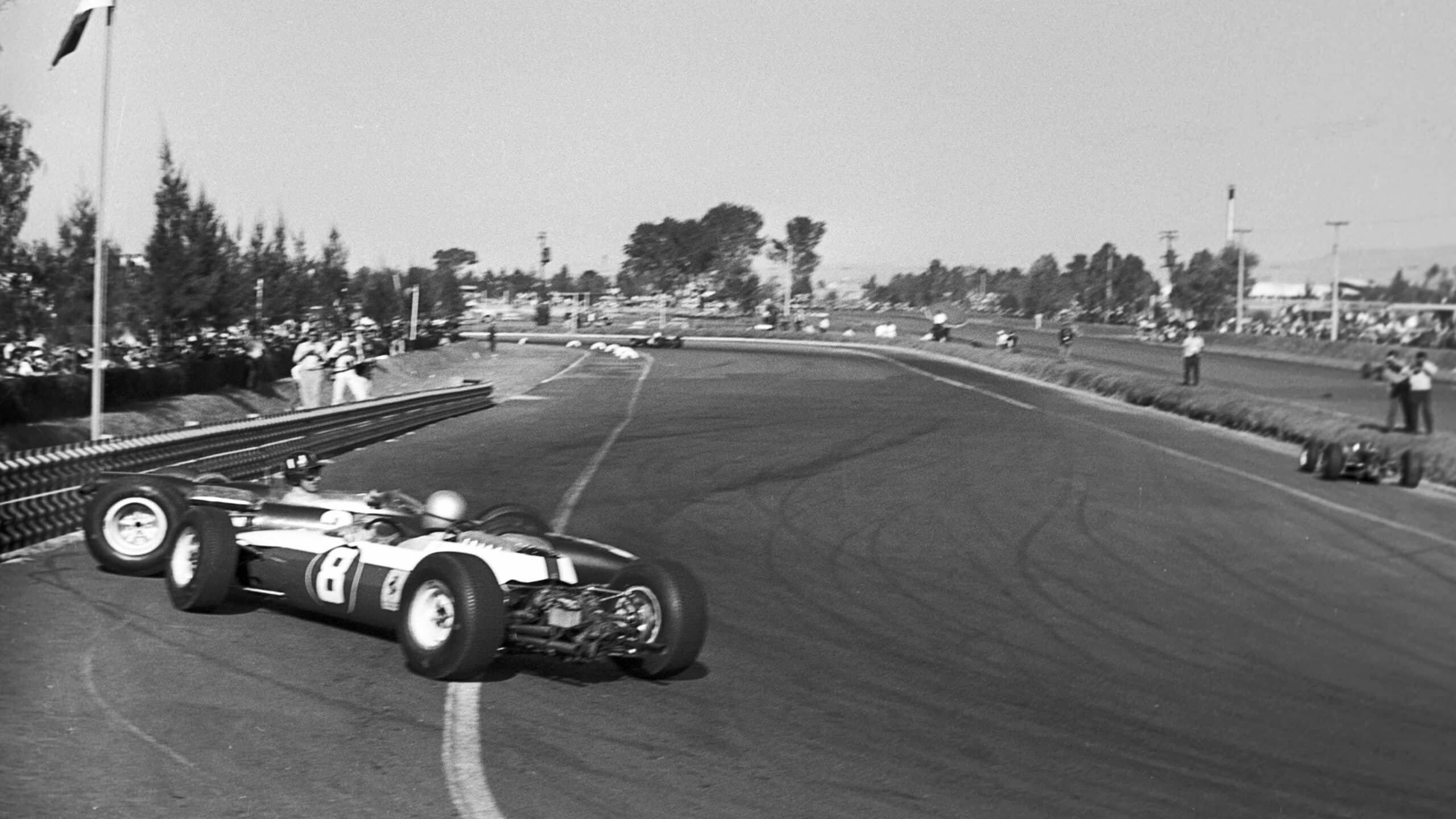 Bandini rams Graham Hill around