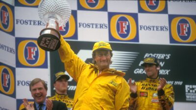 Eddie Jordan celebrates 1998 Belgian GP win on podium