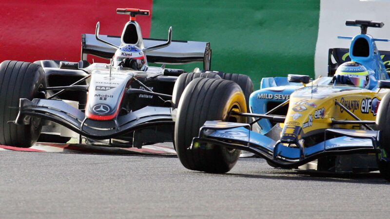 Kimi Raikkonen and Fernando Alonso battle on track