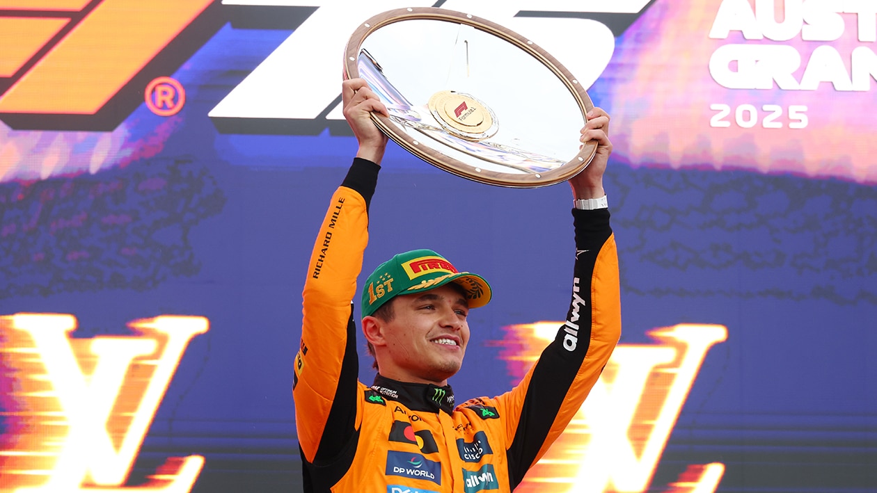 Lando Norris holds trophy after winning the 2025 F1 Australian Grand Prix