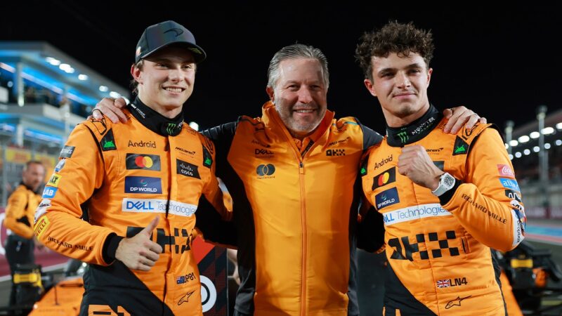Lando Norris with Zak Brown and Oscar Piastri at 2024 Qatar Grand Prix