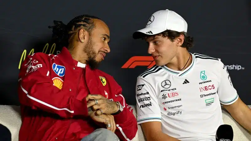 Lewis Hamilton talks to Kimi Antonelli in F1 press conferecne ahead of the 2025 F1 Australian Grand Prix
