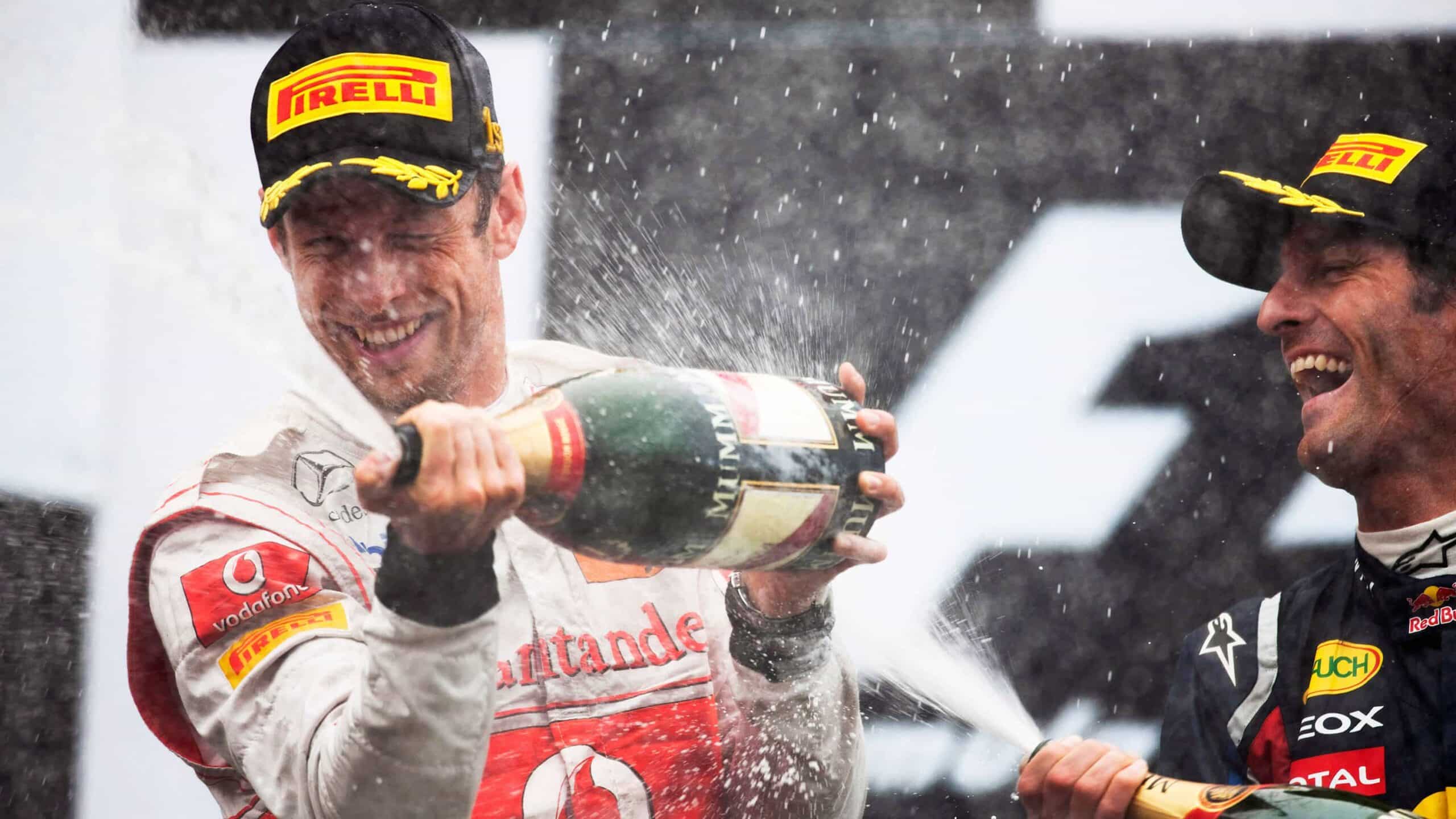 Mark Webber Soaks Jenson Button on the podium