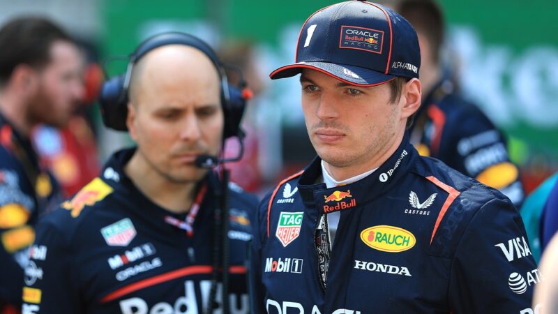 Max Verstappen on the 2025 F1 Chinese GP grid with race engineer Gianpiero Lambiase in background