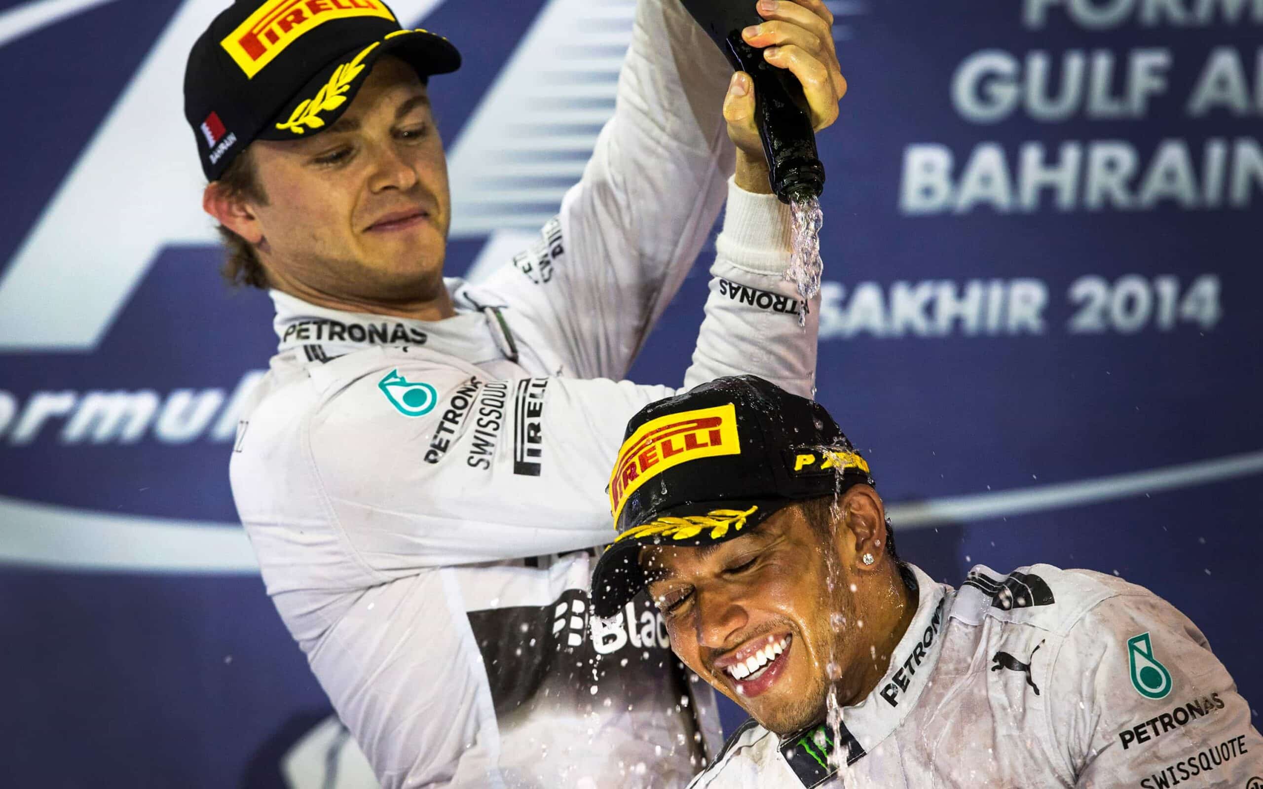 Nico Rosberg pours champagne on Hamilton