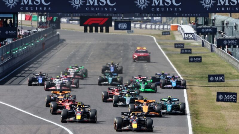 Red Bull-Honda drivers Max Verstappen and Sergio Perez lead the field at the start of the 2024 Japanese Grand Prix in Suzuka. Photo: Grand Prix Photo