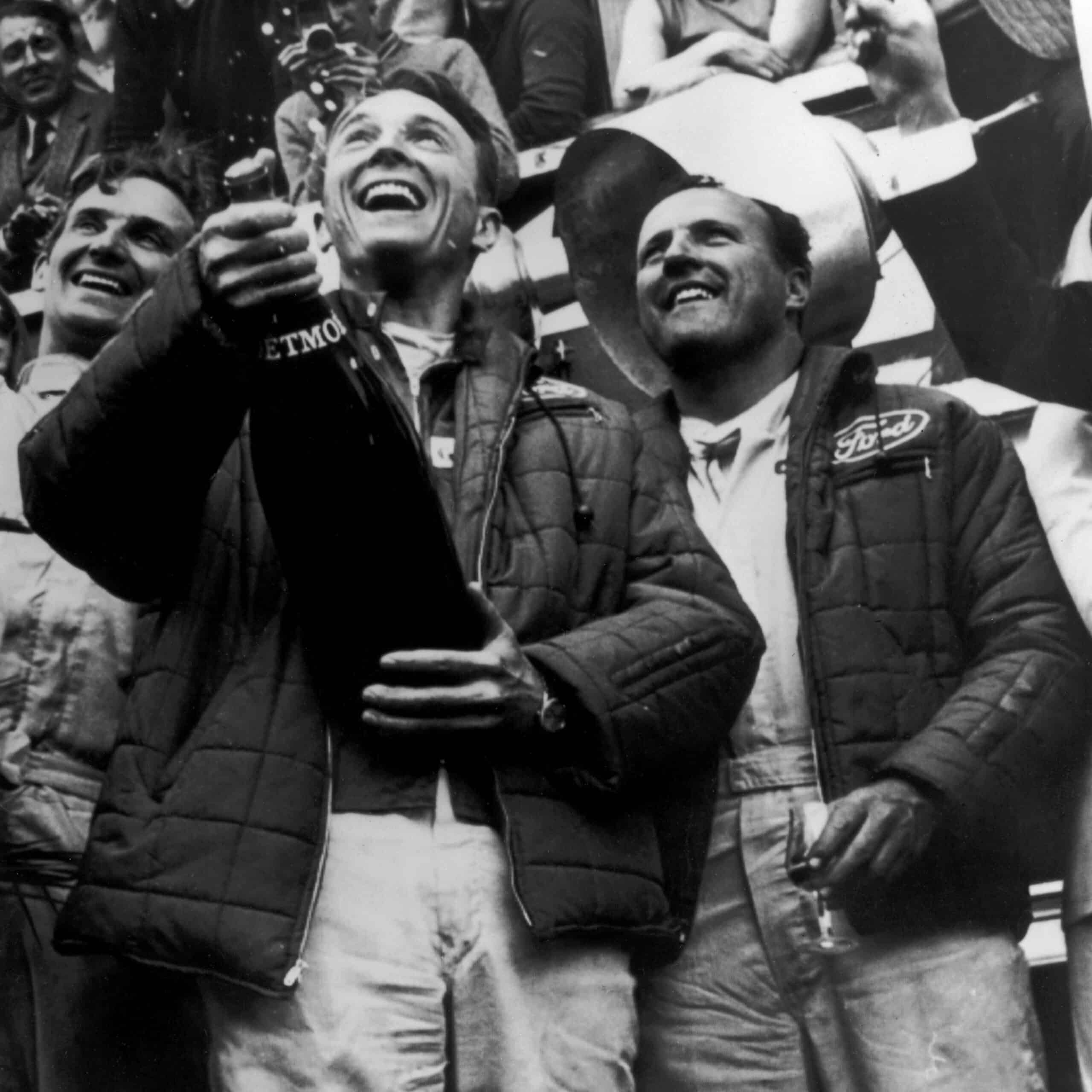 Dan Gurney popping champagne