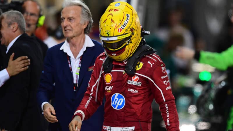 Luca Montezemolo behind Lewis Hamilton at the 2025 F1 Bahrain Grand Prix
