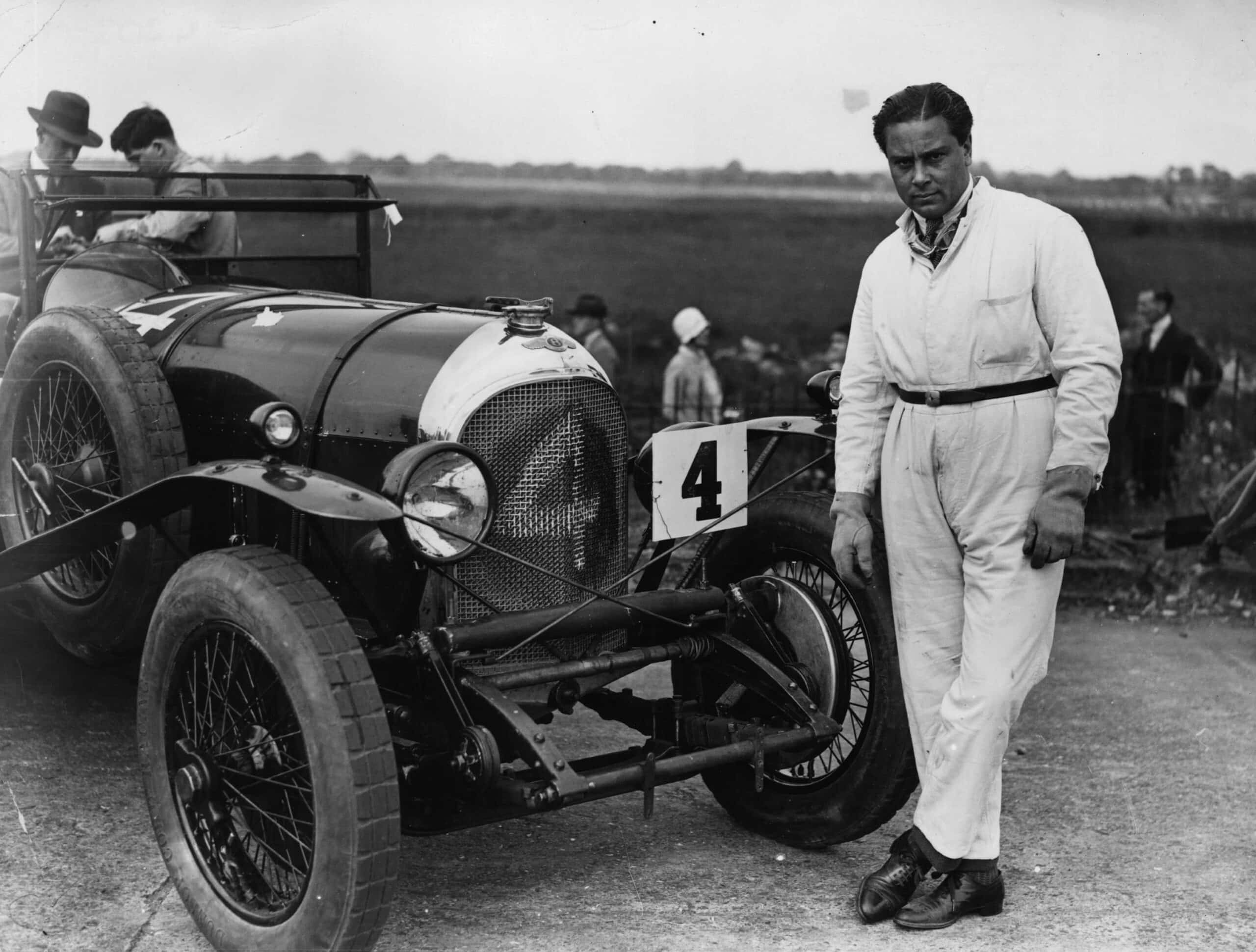 Woolf Barnato standing by his car