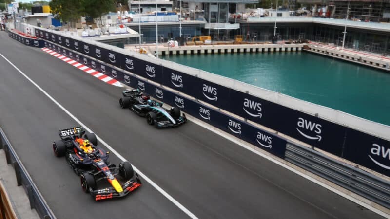 Sergio Perez (Red Bull-Honda) and George Russell (Mercedes) at the2024 Monaco Grand Prix